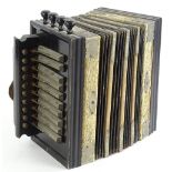 A Dulcet Brand piano accordion or squeeze box, with simulated snakeskin canvas and ebonised