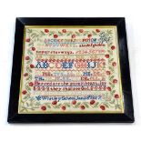 A mid 19thC wool work sampler, embroidered by Elizabeth Errington age 13 years, Whitley School,