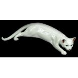 A large Royal Copenhagen porcelain cat, with a plain white glaze, numbered 059, 45cm L.