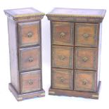 Two similar Eastern hardwood three drawer chests, each applied with pierced and hammered brass on