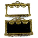 A pair of late 19thC gilt gesso wall mirrors, each with a laurel crest, the rectangular plate