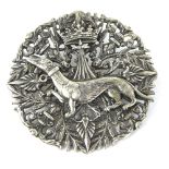 A Cannetille filigree whippet and crown brooch, of circular form with leaves and scrolls and central