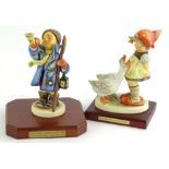 Two similar Hummel limited edition figures, one from the Guild Millennium collection, number 40 of