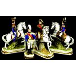 A collection of German porcelain figures, each modelled in the form of a general on horseback, to