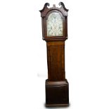 Pattison, Halifax, a mid 19thC oak and mahogany cross banded longcase clock, the arched dial later