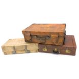 A collection of cases, to include a simulated brown crocodile skin case, possibly for a vintage car,