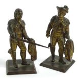 Two gilt bronze figures of matadors, one drawing sword, on square bases , 9cm H.