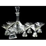 A Kosta Boda 1950s/60s liqueur set, comprising faceted decanter and stopper and six glasses, and a