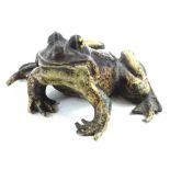 A cold painted bronze model of a seated toad, impressed marks to underside, numbered 1572, 6cm W.