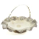 A George V silver basket, with a loop handle and shaped edges, Sheffield 1928 by Mappin & Webb,