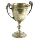 A George V silver trophy by Walker and Hall, of campana form, with an acanthus capped scroll handles