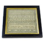 An early 19thC embroidered sampler, stitched with a religious motto, sample alphabet by Emily