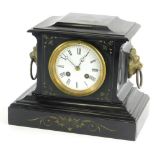 A late 19thC French black slate and parcelled gilt mantel clock, the enamel dial with Roman