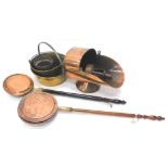 A collection of metalware, to include a copper coal scuttle with shovel, brass preserving pans,