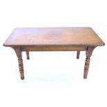 A mahogany coffee table, the rectangular top with canted corners on turned legs, 109cm W.Provenance: