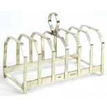 An Elizabeth II five division silver toast rack, with loop handle, Birmingham 1975, 2¾oz, 11cm W.