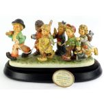 A Hummel figure group made for the Millennium, titled Worldwide Wonder, limited edition number