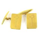 A pair of gent's cufflinks, set with single motif of a bar with claw, yellow metal, unmarked, 6.4g