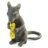 A cold painted bronze model of a mouse with a wedge of cheese, impressed marks to underside, 7cm H.