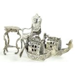 Various Continental white metal ornaments, miniature chair, 6cm H, table and two boats, various