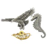 Three brooches, to include a silver and marquasite set eagle brooch, 7cm wide, a silver and