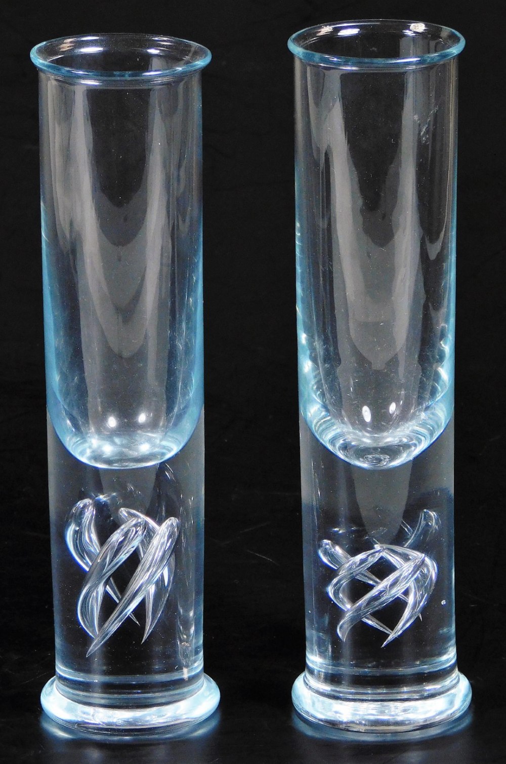 Two Holmegaard Highlife Per Lutken glasses, in clear glass with swirl design to the lower