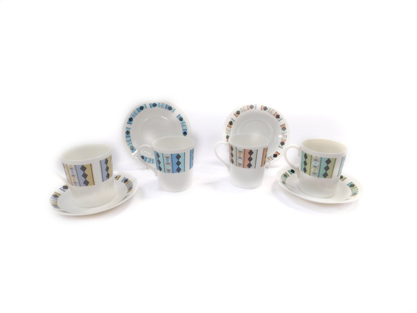 A set of four mid 20thC Royal Adderley porcelain coffee cups and saucers, decorated in the