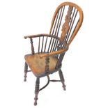 A mid 19thC yew, ash and elm Windsor chair, with a pierced splat, spindle turned supports and