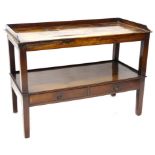 A 19thC mahogany washstand, the rectangular top with a raised gallery above an under tier with two