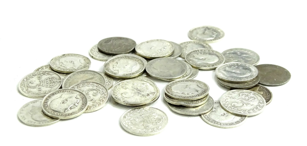 Thirty six pre 1920 silver three pence coins, 50g.