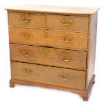 A 19thC oak chest of drawers, the top with a moulded edge above two short and three long drawers,