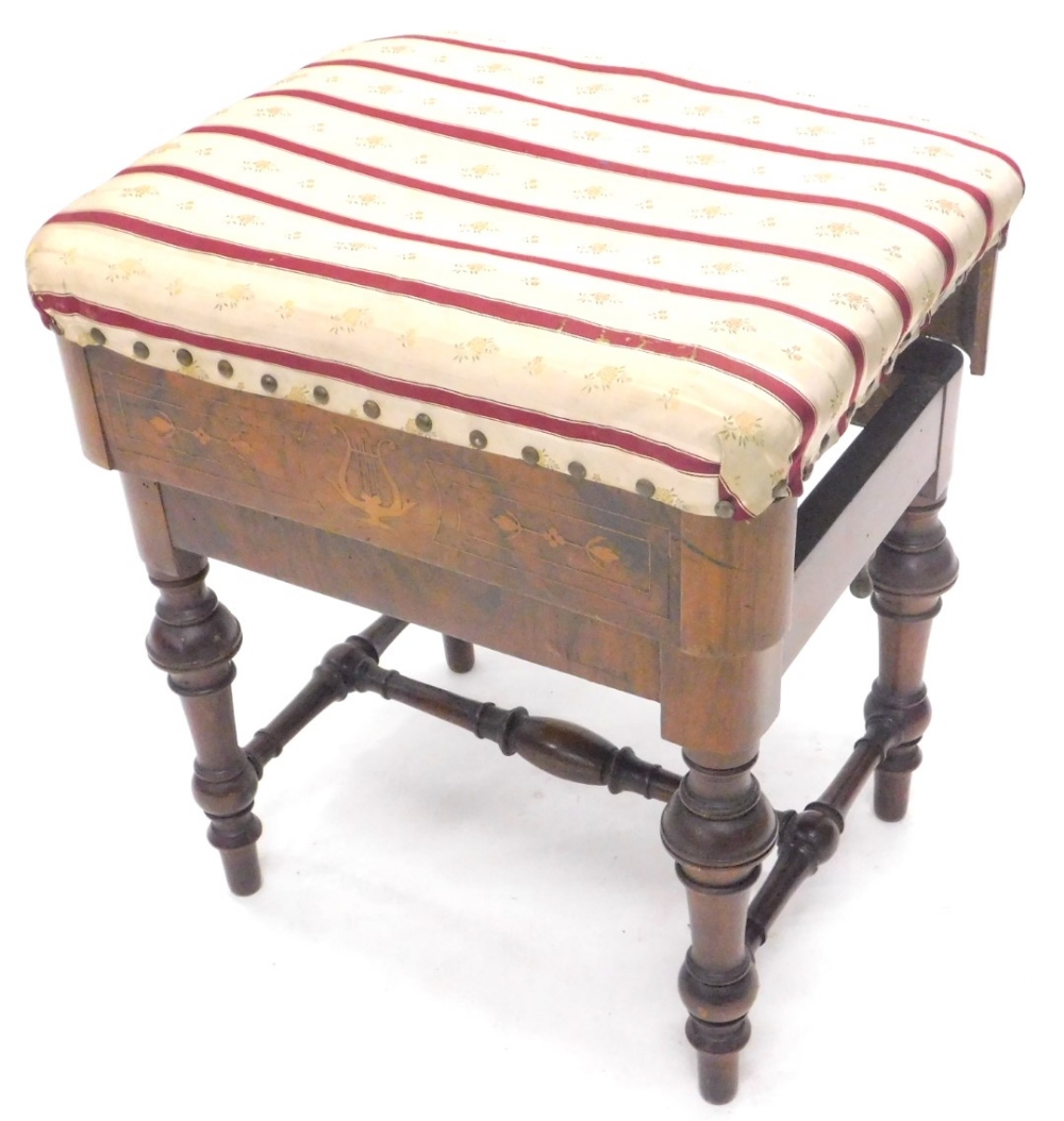 A 19thC walnut and marquetry piano stool, with a padded seat on turned legs with H stretcher,