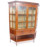 An Edwardian mahogany and satinwood cross banded display cabinet, the moulded cornice with a Greek