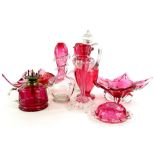 A collection of cranberry tinted glass, to include two Czech pieces, decanter and stopper,