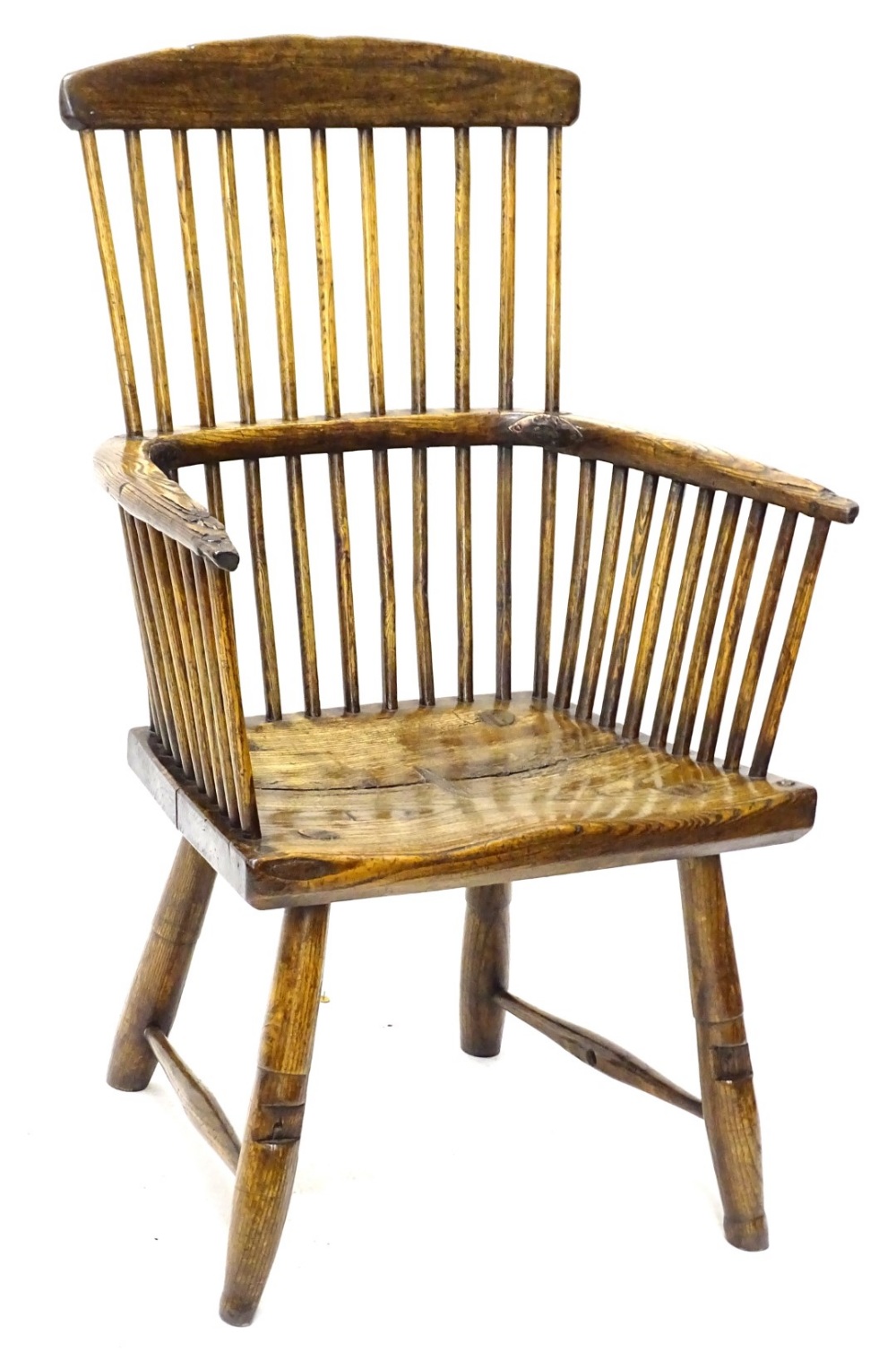 A late 18th/early 19thC ash and elm country made stick back chair, with spindle turned back,