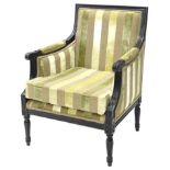 A Continental ebonised armchair, upholstered in striped fabric, on turned and fluted legs.