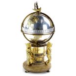 A St James House Co. annular clock, produced in 1984, limited edition, the silvered globe mounted