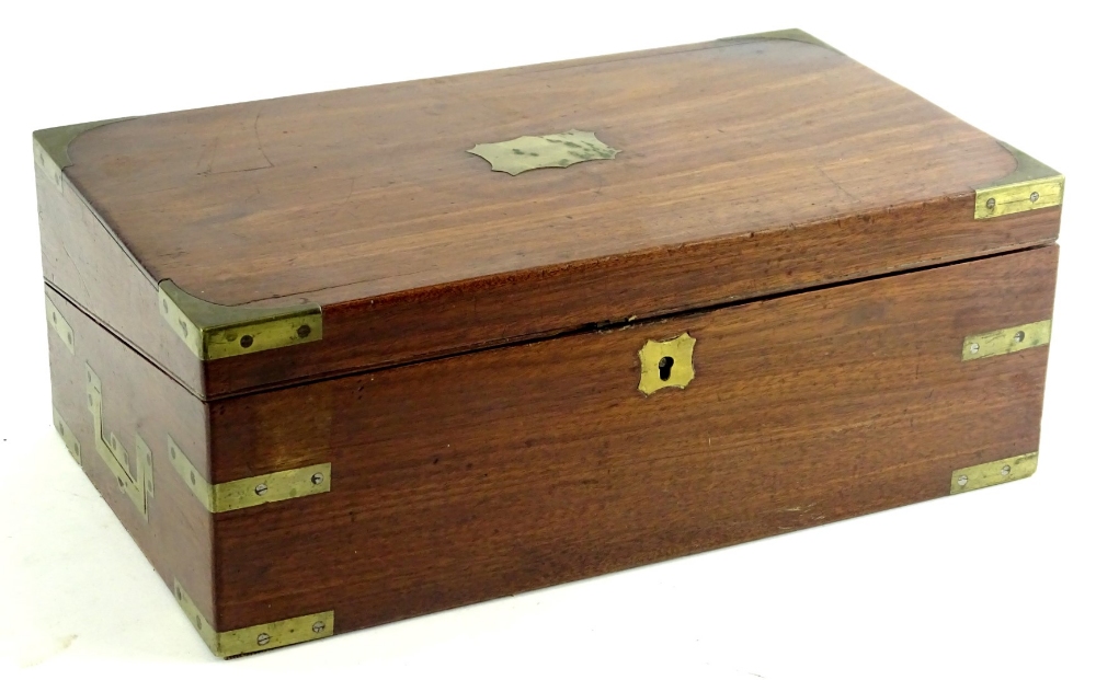 A 19thC mahogany and brass bound campaign style writing box, the hinged lid with a vacant