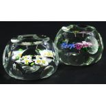 Two similar Whitefriars paperweights, each decorated with flowers and leaves, 7cm W.