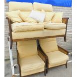 A Parker Knoll bergere three piece suite, with stained beech frame, upholstered in patterned gold