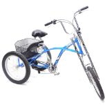 A Mission Triad chopper style tricycle, in blue with shopping basket to the rear.