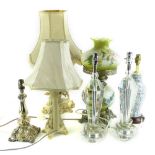 A collection of table lamps, to include a pair of facetted glass examples with chrome plated