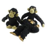 Three early to mid 20thC monkey toys, to include one with rubber hands and feet (AF).