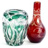 A green flash cut glass vase in the manner of Val St Lambert, 19cm H and a Bohemia style bottle