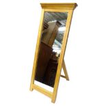 A modern oak dressing mirror, with decorative cross banded border, 151cm H, 59cm W.