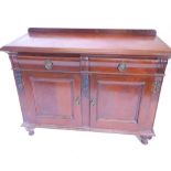 A 19thC walnut sideboard, with a raised back above two frieze drawers and two panel doors flanked by