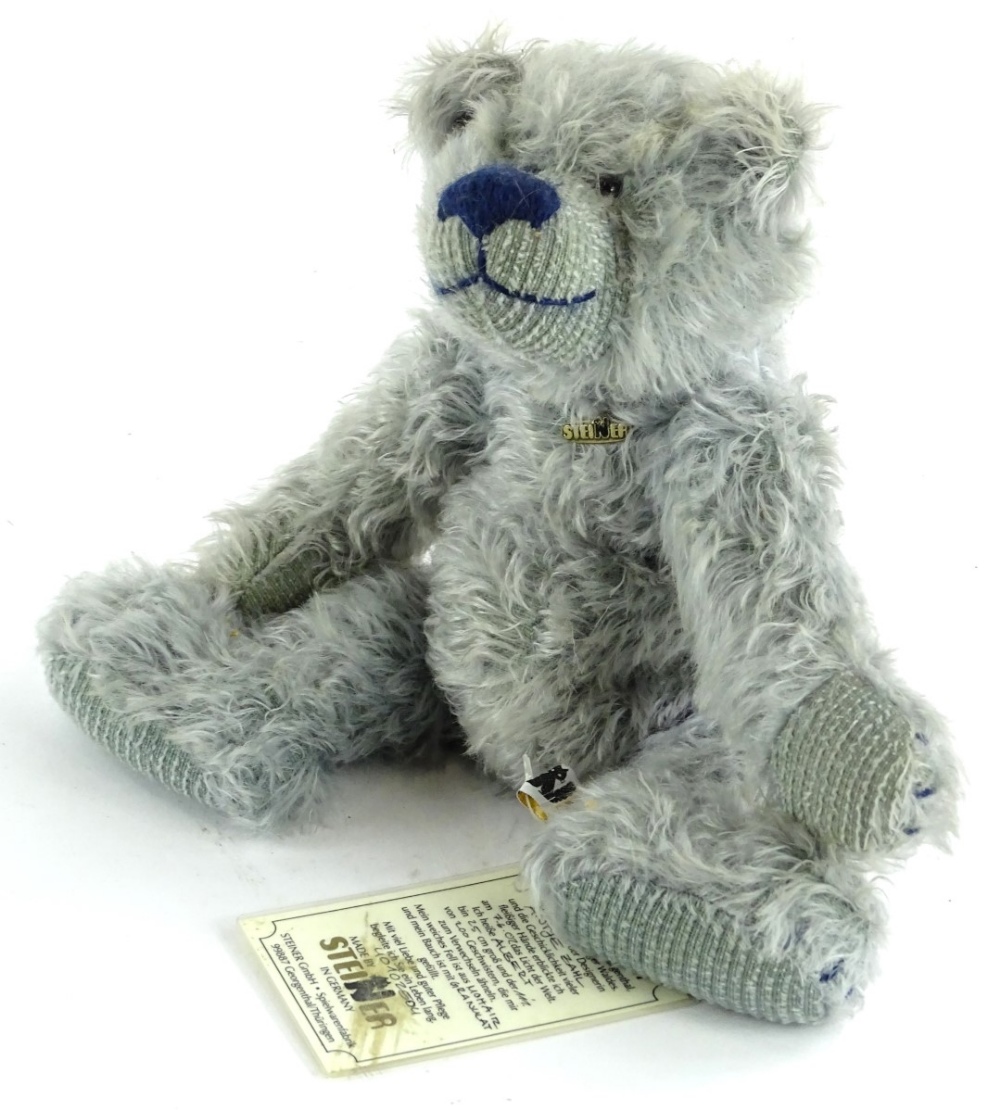 A Steiner teddy bear, Albert, with original tag etc., weighted feet, 29cm L.