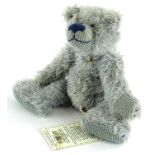 A Steiner teddy bear, Albert, with original tag etc., weighted feet, 29cm L.