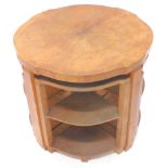 An Art Deco nest of four tables, the largest table with a shaped top and square section supports,