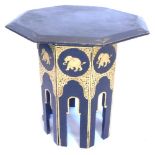 A 19thC papier mache occasional table, the octagonal top with a moulded edge, the faceted base